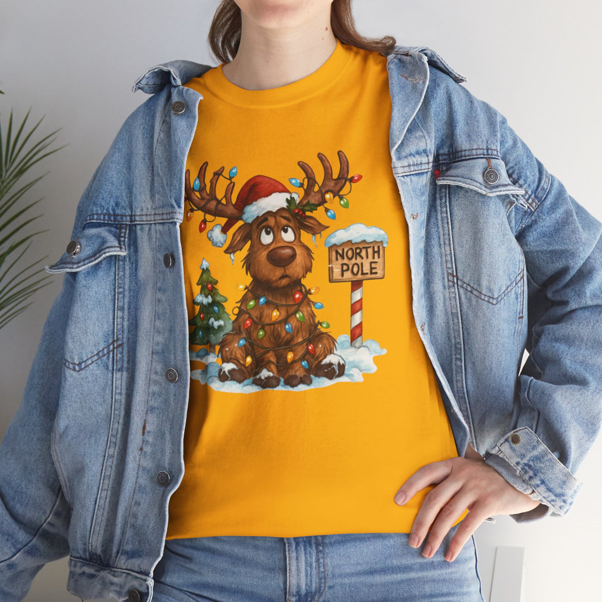 Detailed graphic of the Christmas Reindeer Tee featuring playful elements for a holiday look.