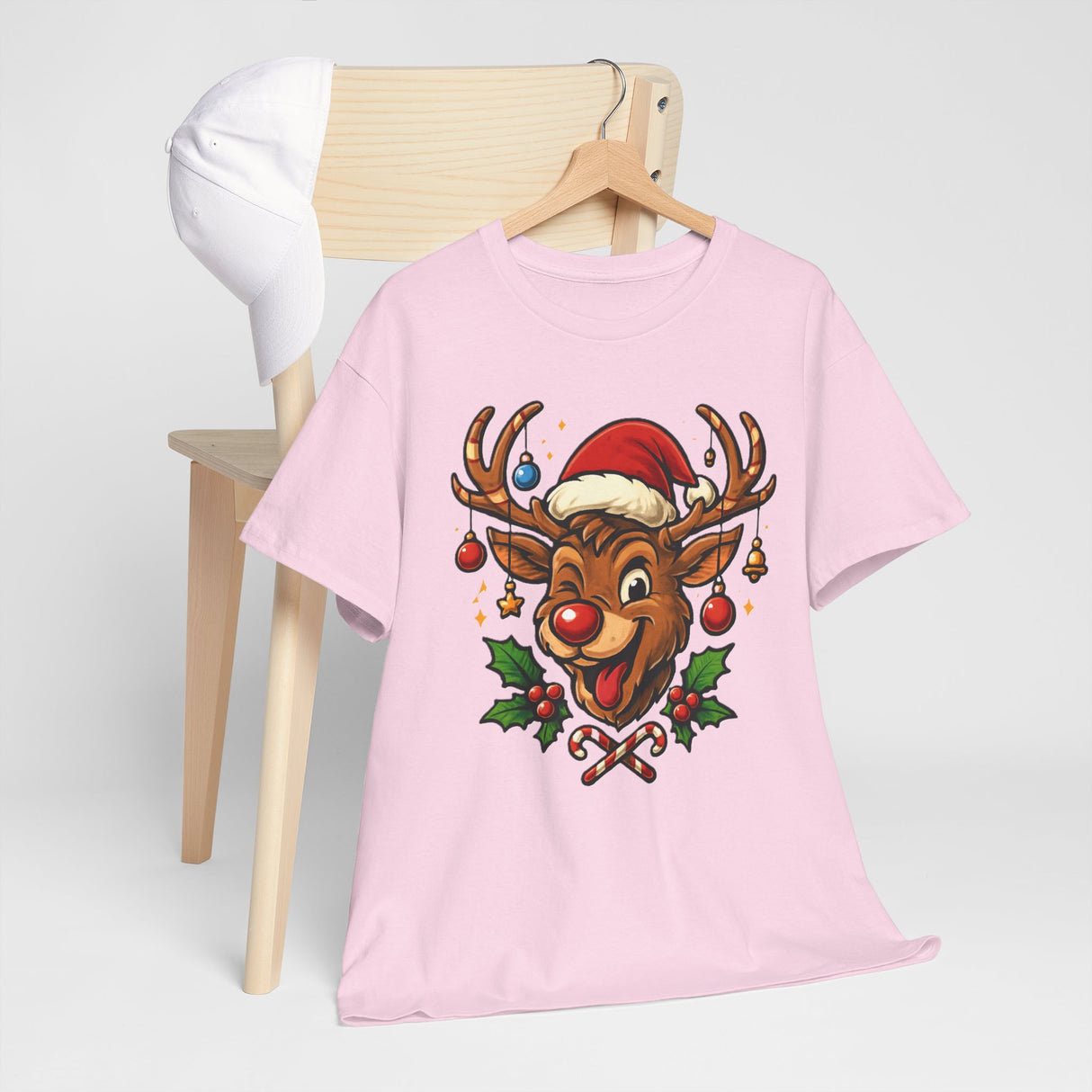 Rudolph design detail on the Christmas Reindeer Tee, perfect for adding whimsy to holiday attire.