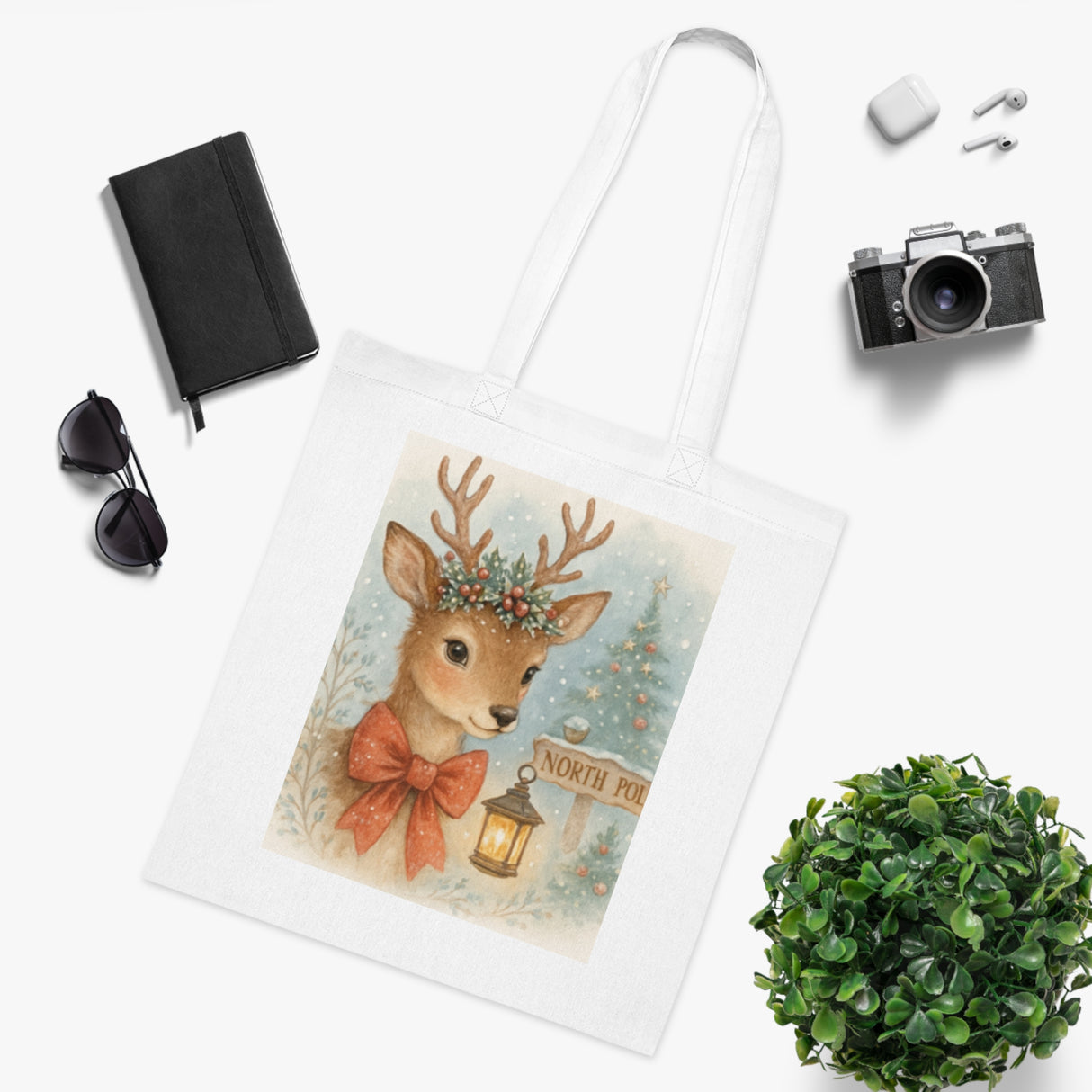 Christmas Reindeer Tote Bag alongside seasonal decorations, showcasing its charming reindeer design.