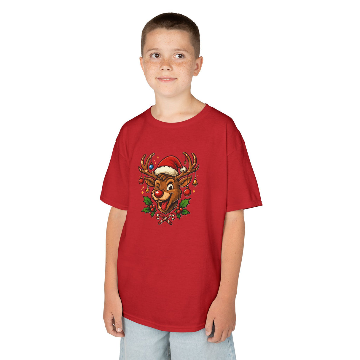 Kids Christmas Reindeer Tee — Cute Santa Hat Rudolph Holiday Shirt shown in a festive family gathering scene.