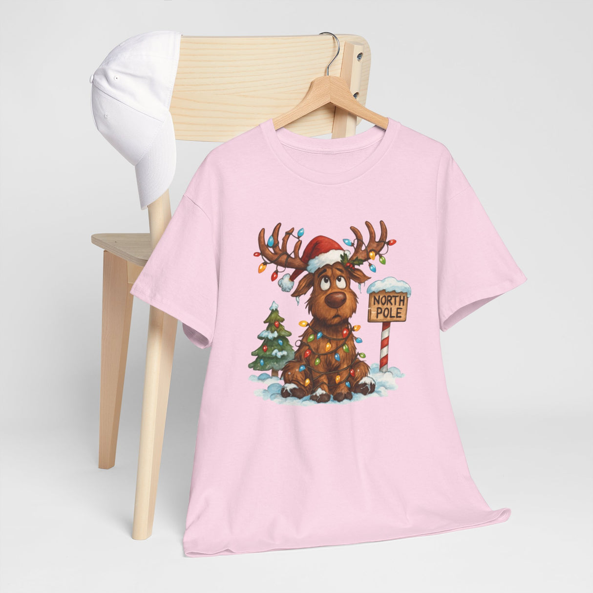 Casual chic look with the Christmas Reindeer Tee, perfect for holiday gatherings.