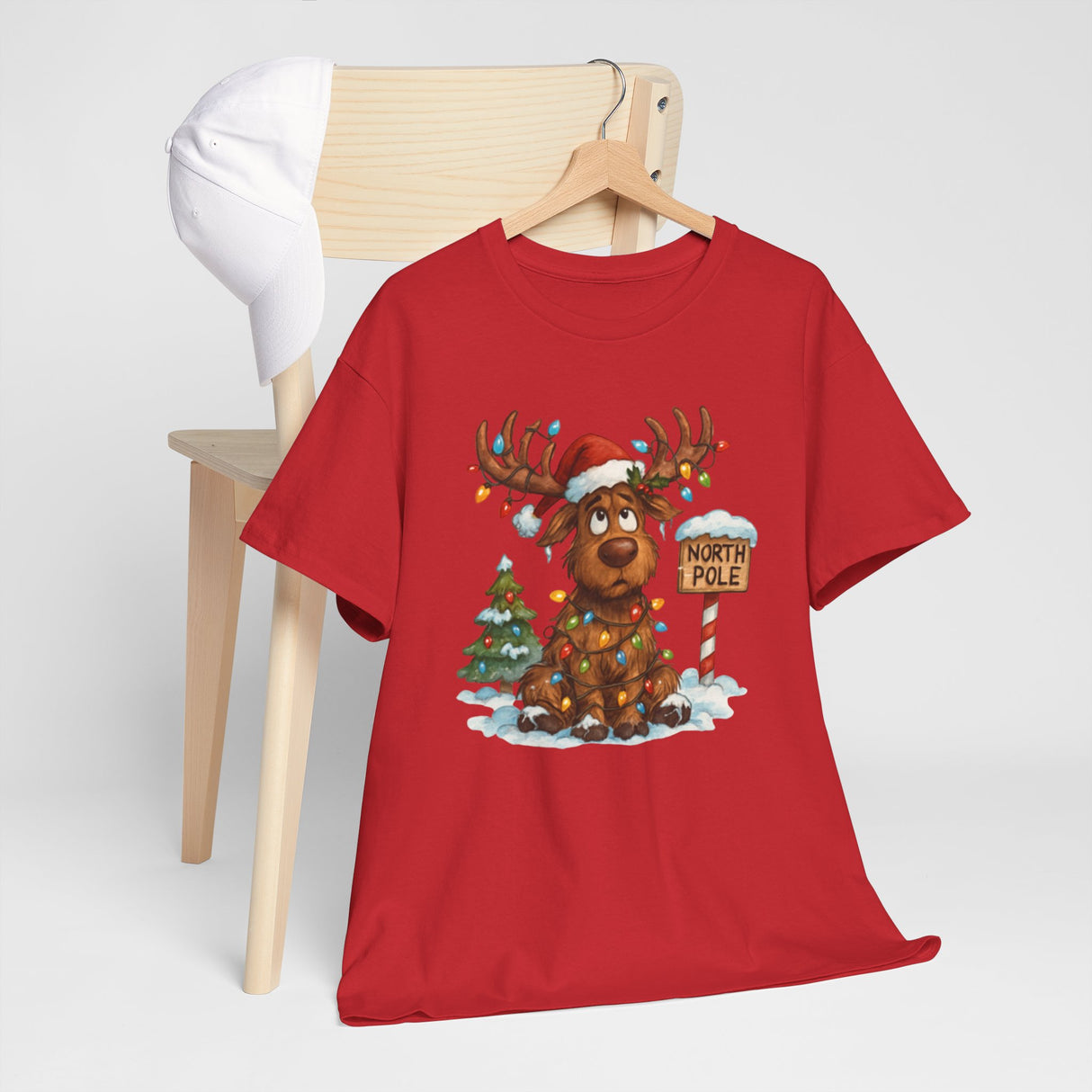 Christmas Reindeer Tee design highlighting holiday fun with a touch of whimsy.
