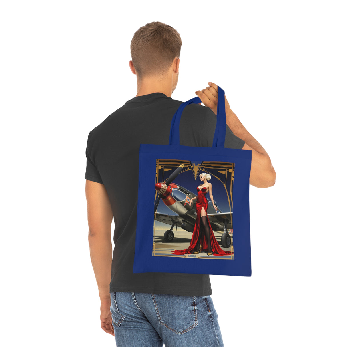 The Vintage Pin-Up Plane Tote — Red Dress Aviation Cotton Tote Bag being used for shopping, showcasing its practicality alongside style.