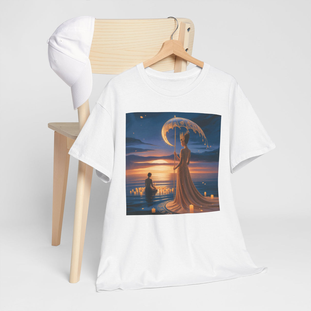 The Romantic Moonlit Couple T-Shirt — Sunset Fantasy Illustration Tee paired with a cozy cardigan for a layered look.