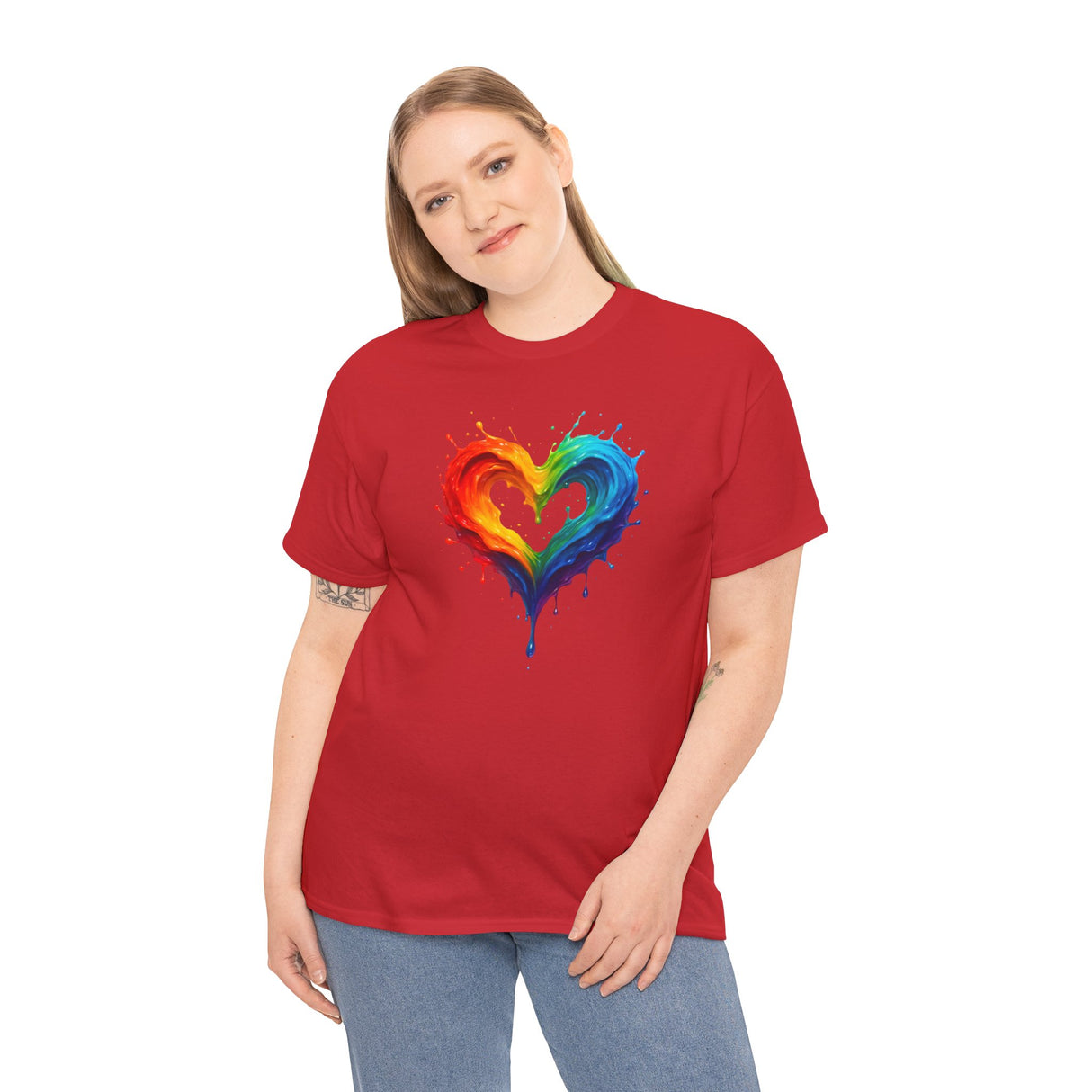 The Rainbow Drip Heart T-Shirt styled with casual footwear, illustrating its relaxed and fun fashion vibe.