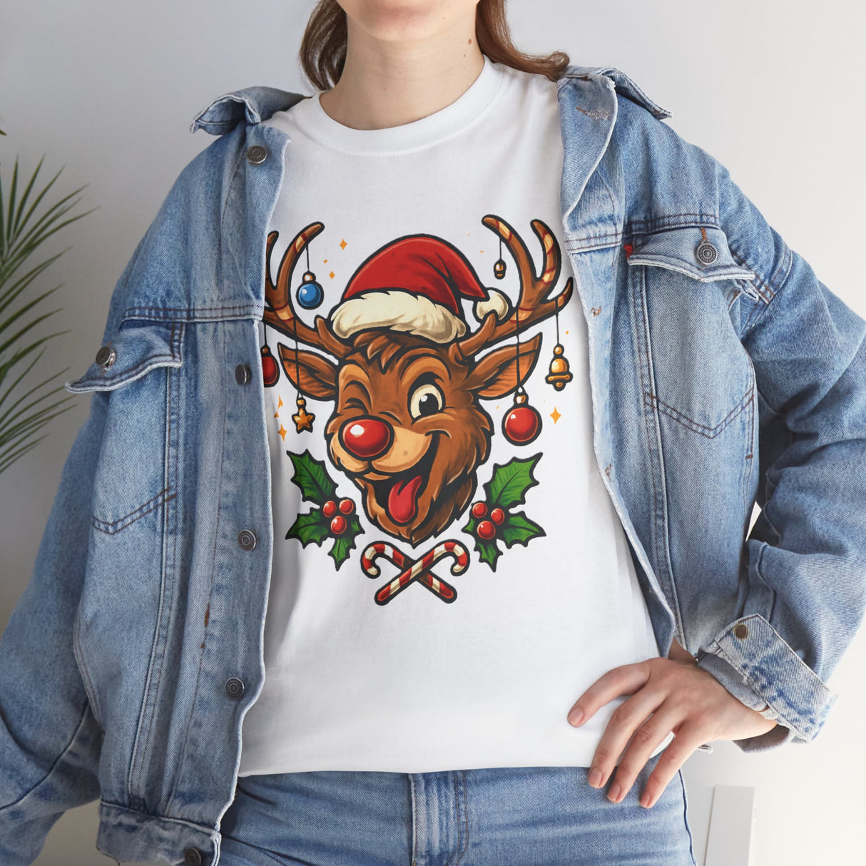 Casual outdoor scene featuring someone in the Christmas Reindeer Tee enjoying hot cocoa during winter.