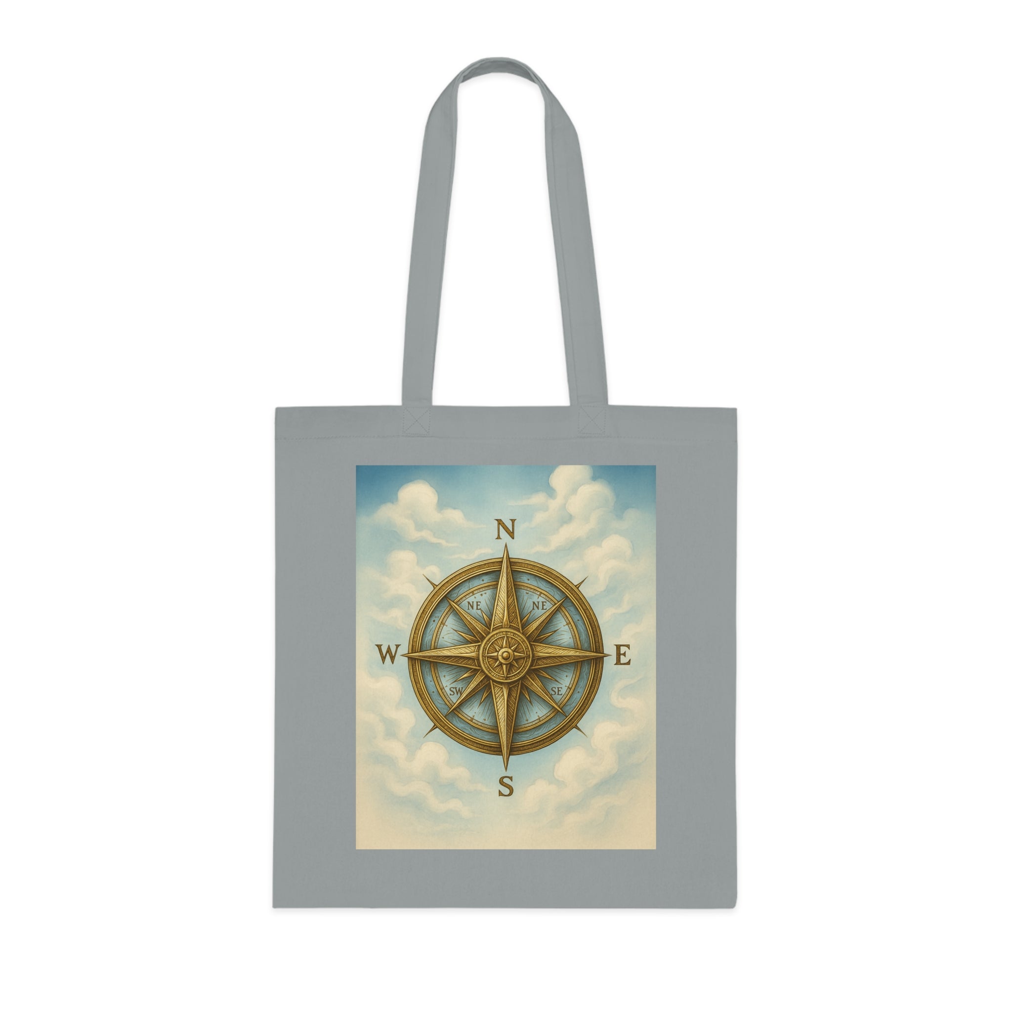Vintage Compass Cotton Tote Bag with a scenic outdoor background giving a travel vibe.