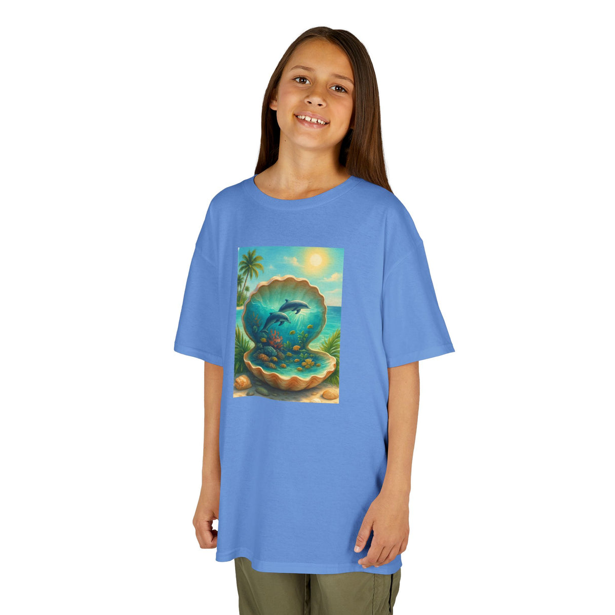 Kids Tee — Ocean Pearl Dolphin Shell Beach Graphic on a hanger showcasing the classic white crew neck design.