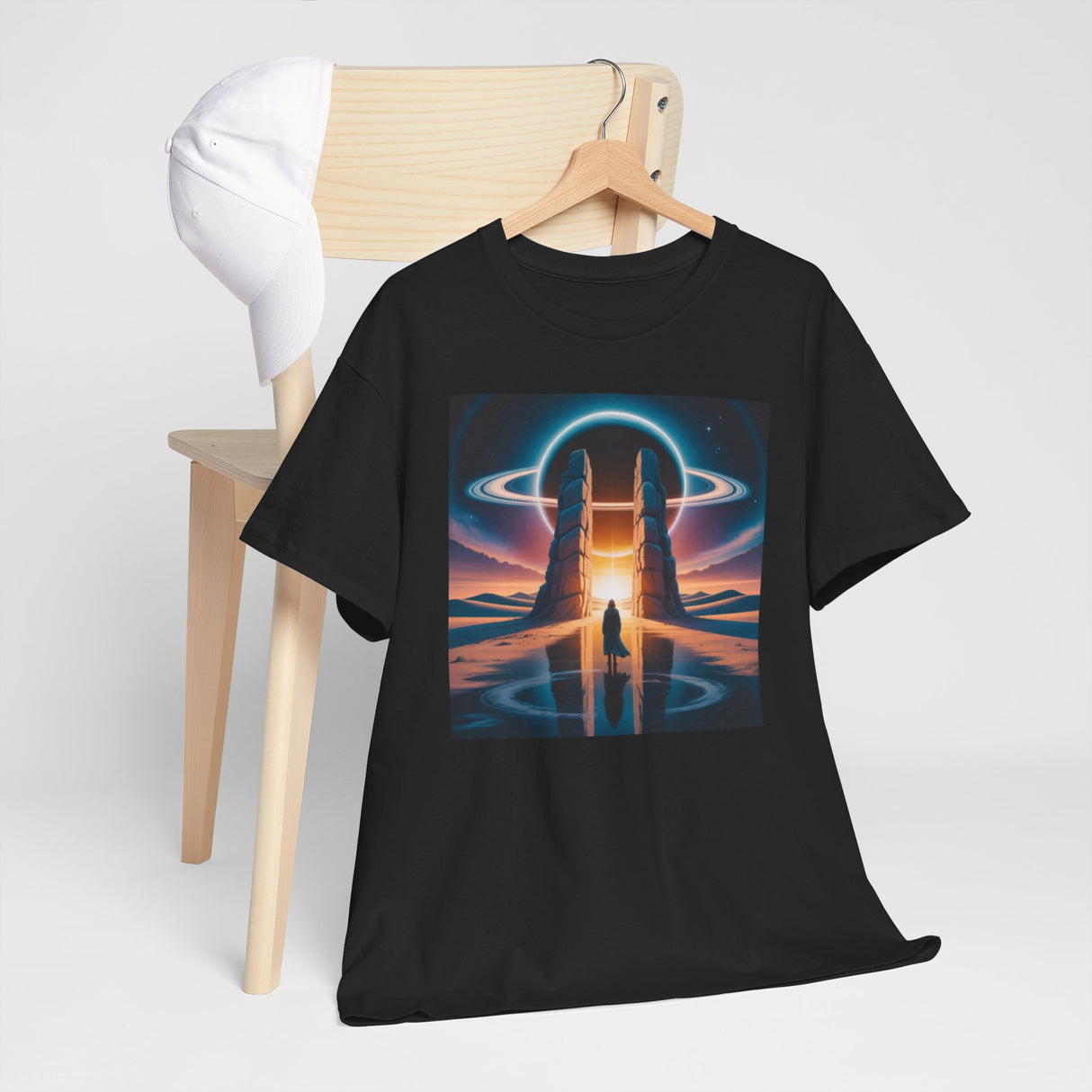 The Cosmic Bridge Graphic Tee accompanied by sci-fi themed objects, appealing to fans of genre art.