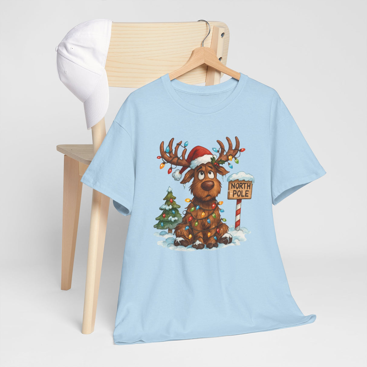 Charming holiday attire captured in the Christmas Reindeer Tee, perfect for casual events.