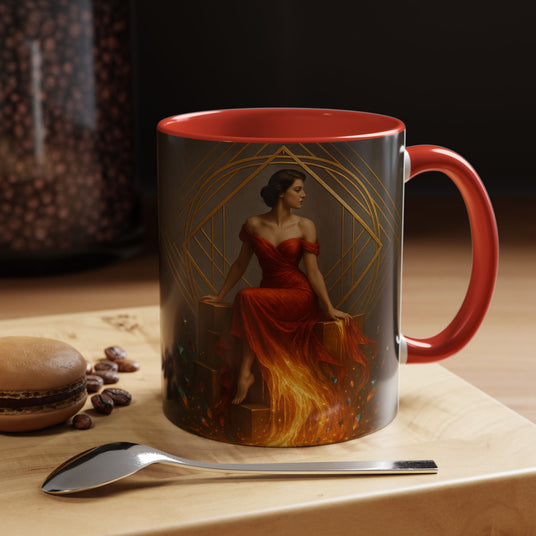 Fiery Goddess Accent Coffee Mug showcasing a woman in a red dress surrounded by warm embers and geometric gold lines.
