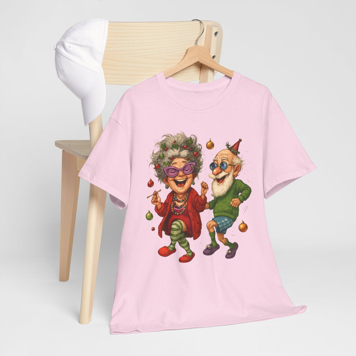 Graphic T-shirt with a lively illustration of senior couple dancing on the Dancing Seniors Illustration T‑Shirt.