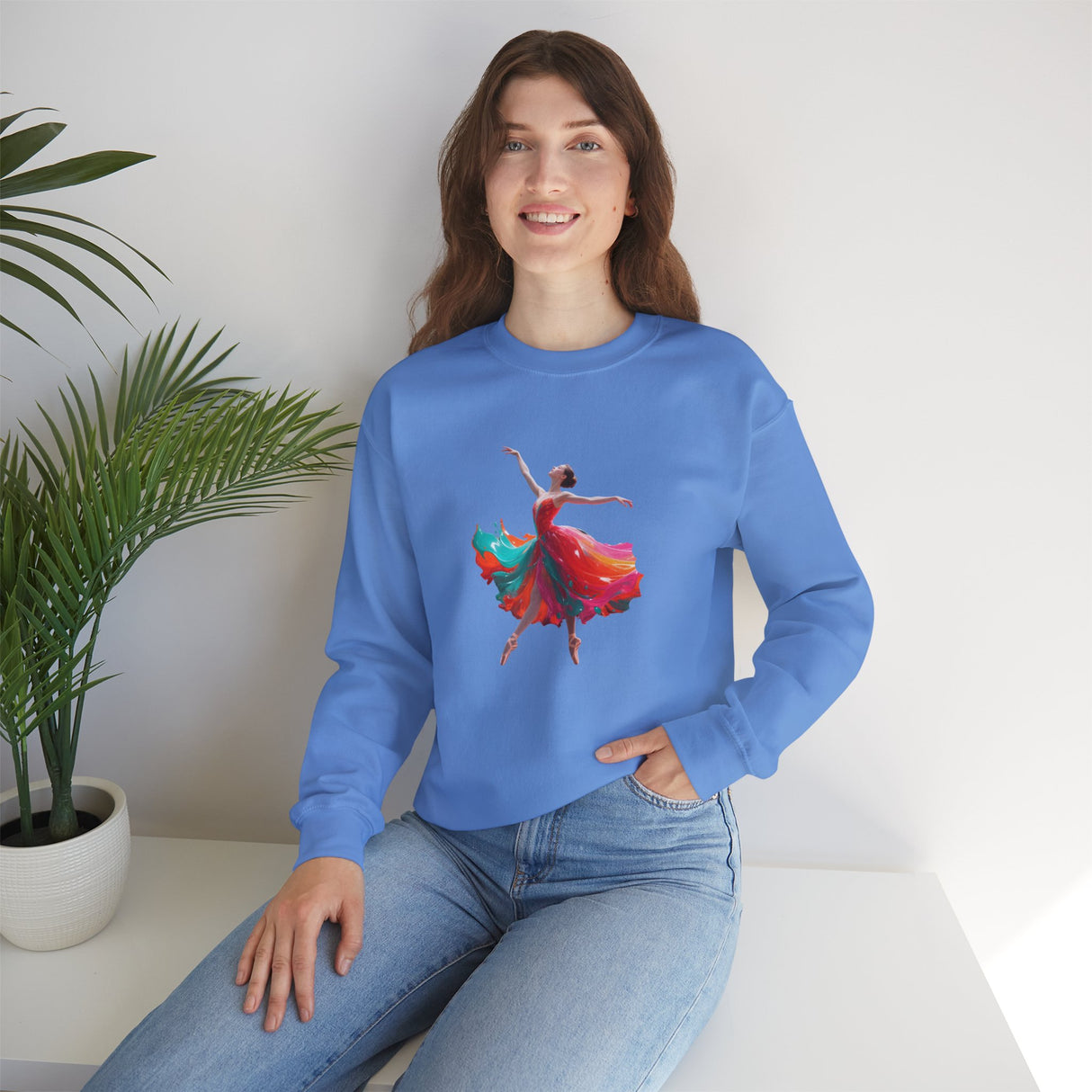 Dance Silhouette Crewneck Sweatshirt displayed on a mannequin highlighting its cozy fit and colorful artwork.