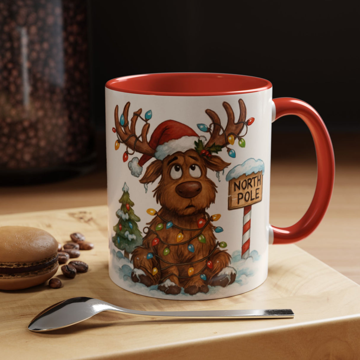 Christmas Reindeer Coffee Mug showcasing a playful reindeer tangled in colorful lights, perfect for holiday vibes.