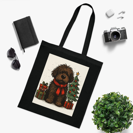 Christmas Dog Tote Bag featuring a cute fluffy pup with a Christmas tree and gifts.