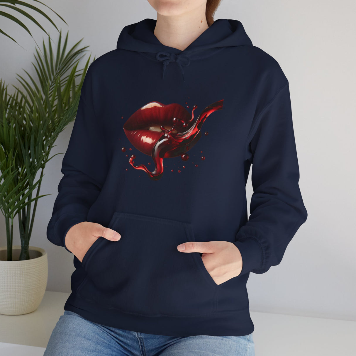 Side view of the Lip Bite Hoodie showing the double-lined hood and color-matched drawstring.