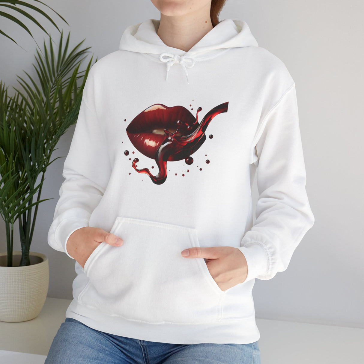 Artistic view of the Lip Bite Hoodie with the bold gothic red lips graphic, ideal for fashion-forward individuals.
