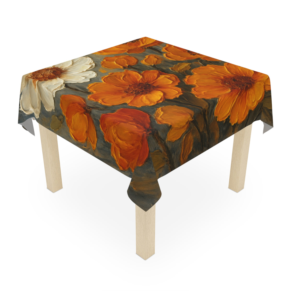 Close-up view of the Autumn Bloom Tablecloth showcasing thick brushstrokes of golden-orange blossoms against a muted background.