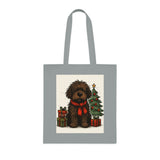 Lightweight cotton Christmas Dog Tote Bag displaying a festive fluffy dog by a decorated tree.