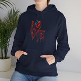Love Kiss Hoodie displayed on a chalkboard background, emphasizing its romantic vibe.