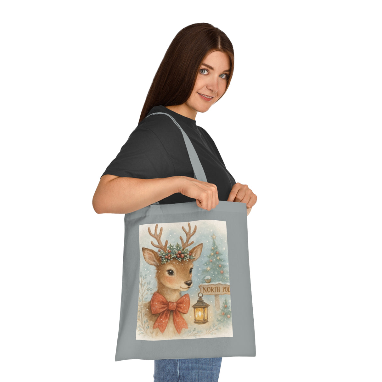 Christmas Reindeer Tote Bag with holiday gifts, showcasing its strong cotton material and festive design.