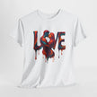 Casual outfit featuring Love Unisex Heavy Cotton Tee paired with jeans and sneakers.