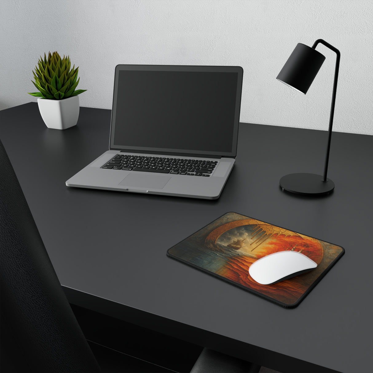 Lifestyle image of the Autumn Voyage Gaming Mouse Pad on a desk next to a keyboard, highlighting its compact size and artistic design.