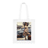 A close-up of the Vintage Jetsetter Cotton Tote Bag showcasing its vibrant retro travel print.