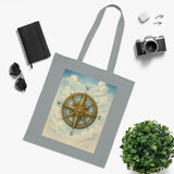 Vintage Compass Cotton Tote Bag on display in a retail store showcasing its design.
