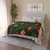 Cozy Christmas Ornament Throw Blanket featuring a festive red and green design, perfect for the holiday season.