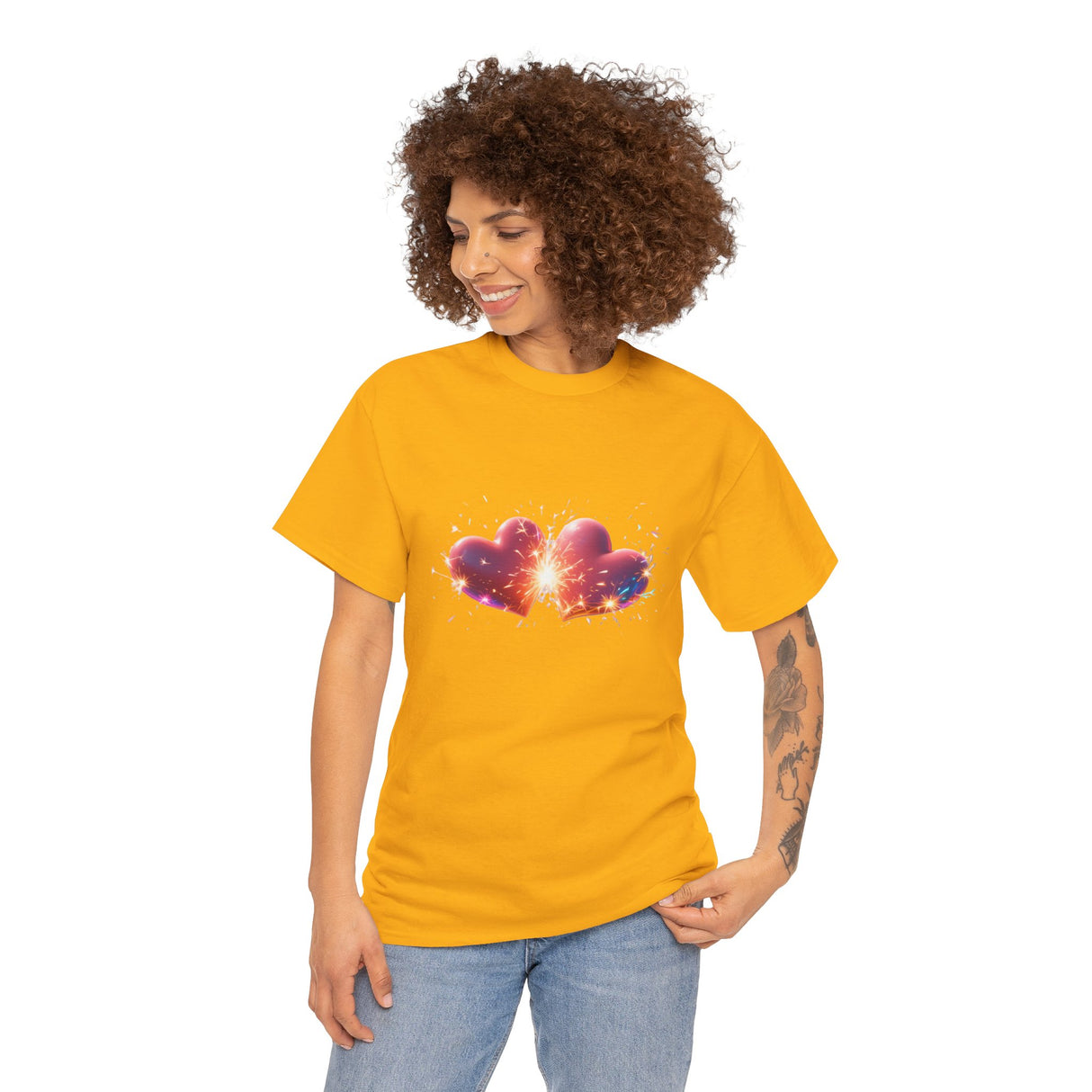 Detail view of the Cosmic Heart T-Shirt's twin heart motif in ember, violet, and gold.