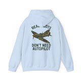 Casual setting showcasing the Pilot Hoodie – 'Real Pilots Don't Need Autopilot' with a vintage fighter plane graphic.