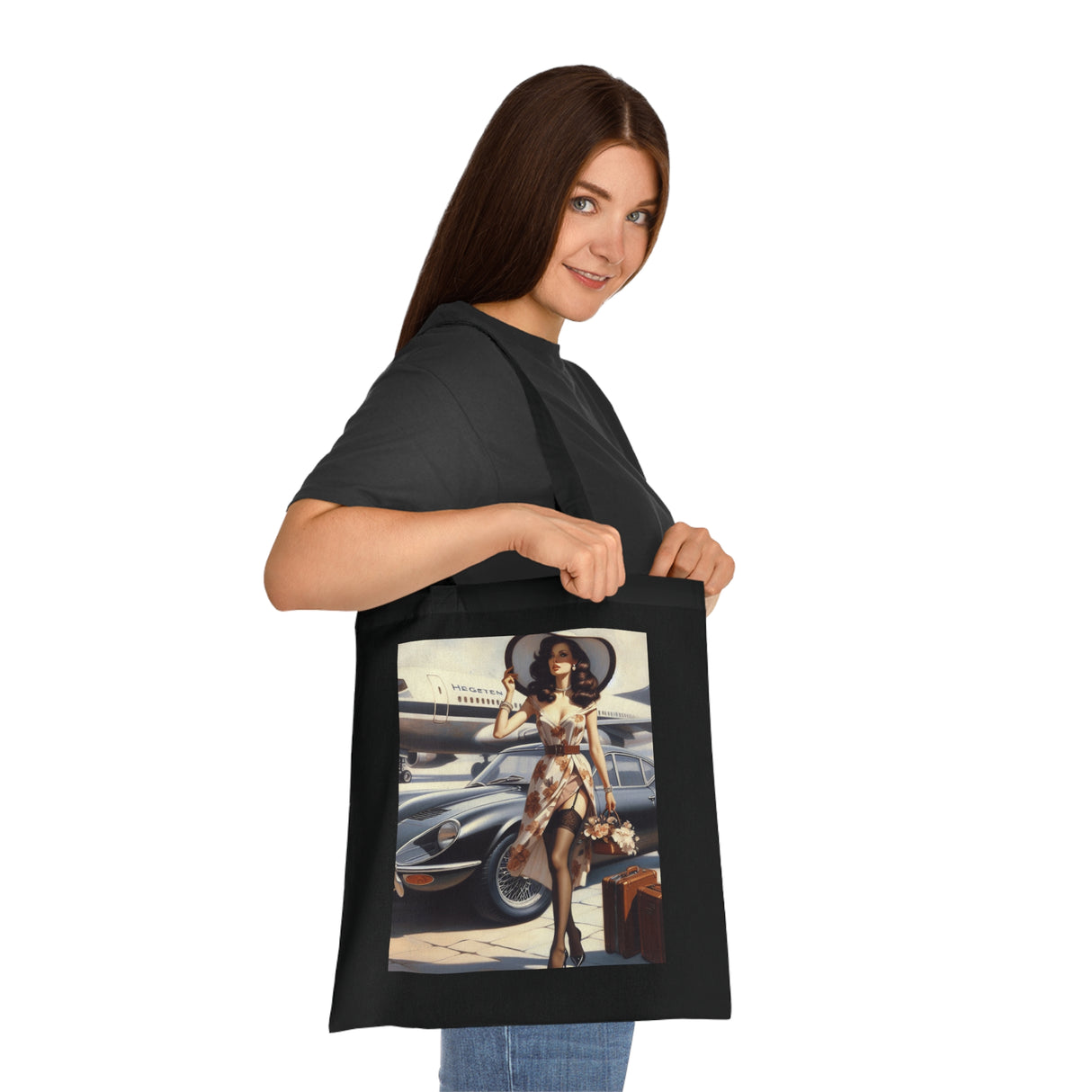 The Vintage Jetsetter Cotton Tote Bag with its double-sided retro travel print, perfect for any adventure.