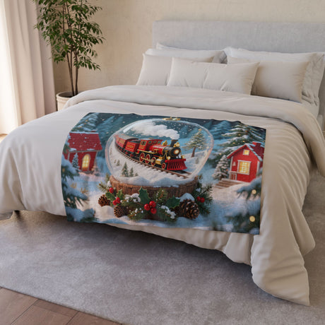 Cozy Christmas Train Snow Globe Blanket featuring a red steam train in a snowy scene, perfect for winter nights.