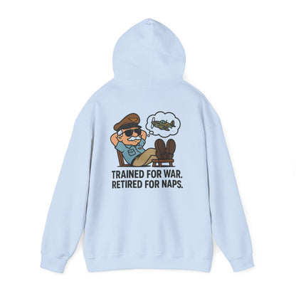 Lifestyle shot of the Retired for Naps Hoodie, fitting for relaxing at home or outdoor gatherings.