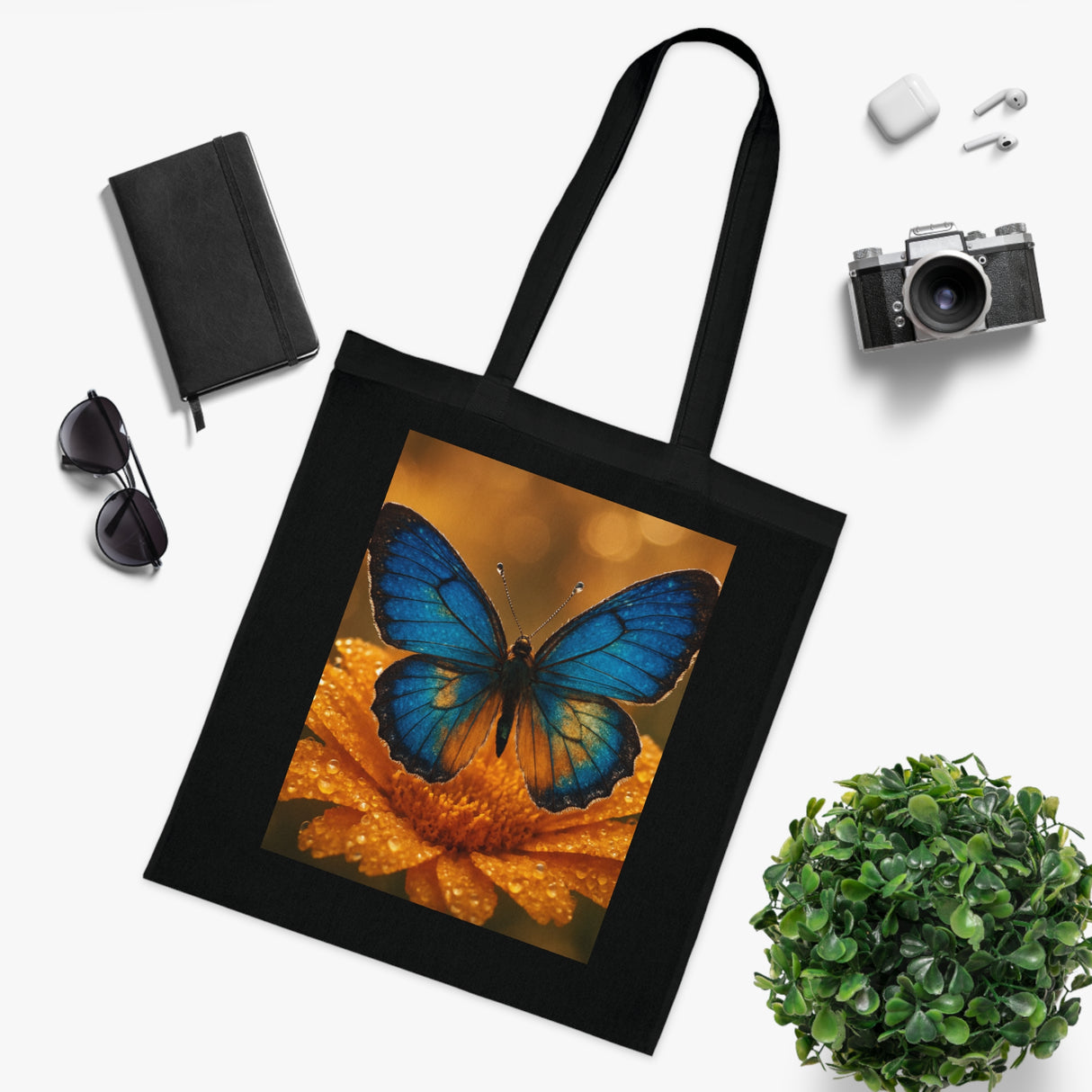 Flat-lay view of several Blue Butterfly Cotton Tote — Nature Floral Reusable Shopper Bags, demonstrating their stylish appeal.