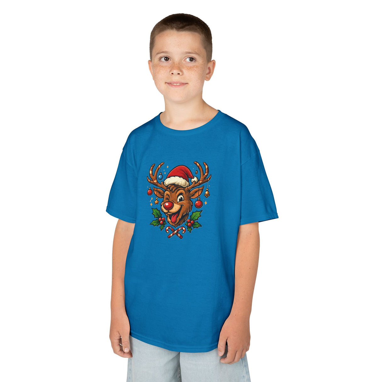 Kids Christmas Reindeer Tee — Cute Santa Hat Rudolph Holiday Shirt showcased in a stylish indoor holiday decor setting.