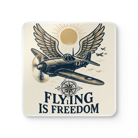 Flying Is Freedom Cork Coaster Set showcasing a vintage airplane design with colorful graphics and a glossy finish.