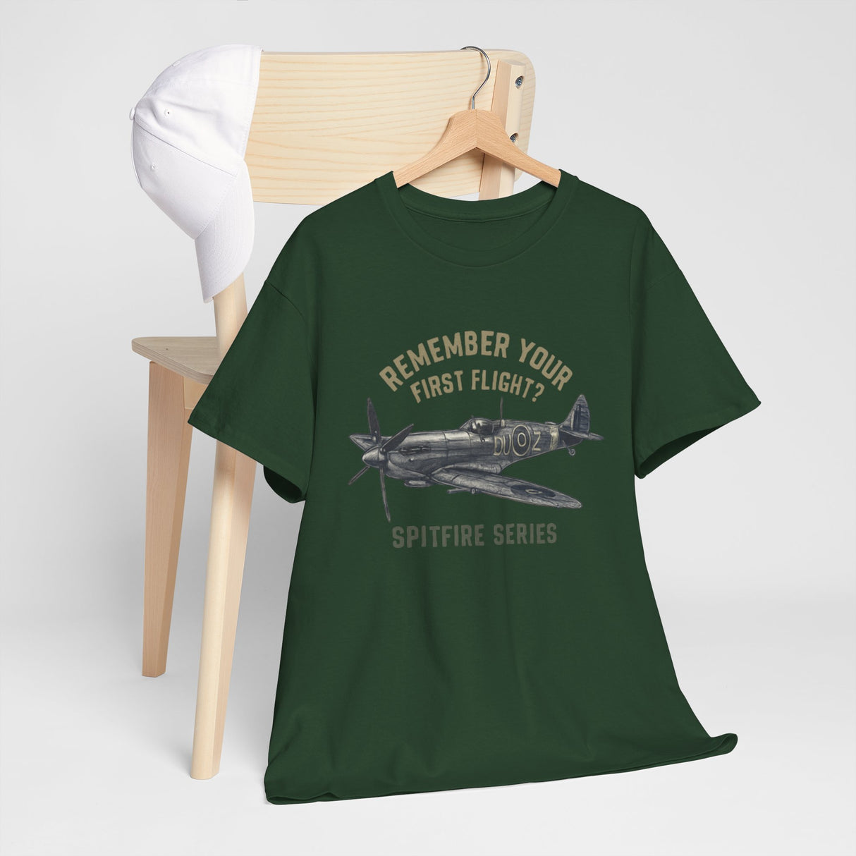 The Spitfire Series 'Remember Your First Flight' Tee styled with accessories for aviation enthusiasts.