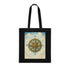Vintage Compass Cotton Tote Bag displayed on a picnic blanket highlighting its stylish design.