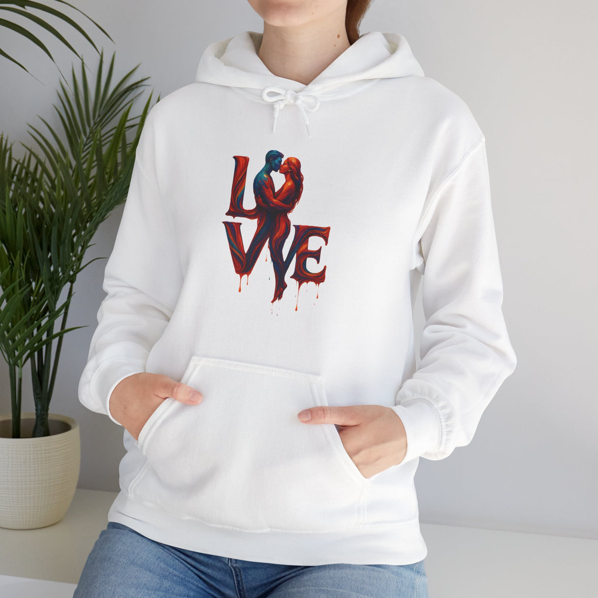 Laid flat, the Love Kiss Hoodie shows off its cozy cotton-poly blend material and stylish design.