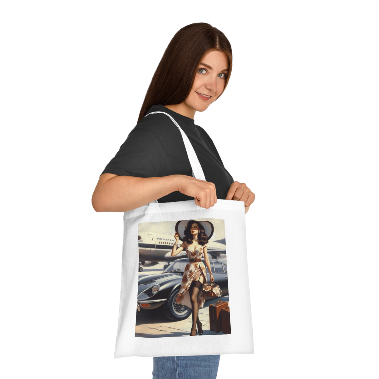 Vintage Jetsetter Cotton Tote Bag displayed on a table, highlighting its care instructions and eco-friendly attributes.