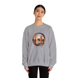 Crewneck Sweatshirt - Sunset Couple Silhouette in Dripping Circle displayed on a hanger, emphasizing its cozy design and artistic print.