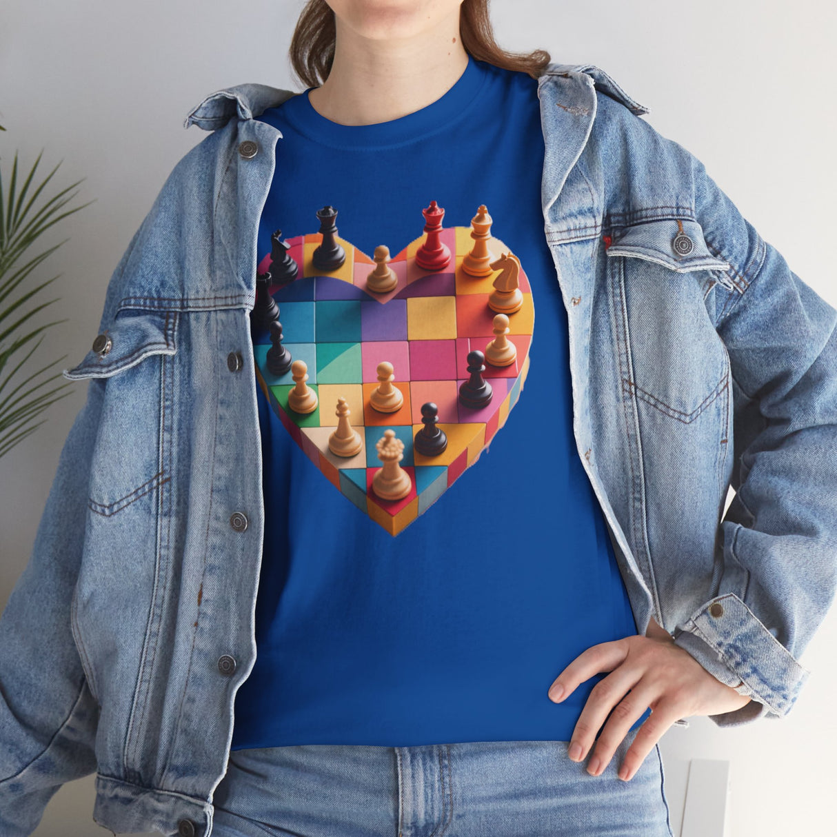 Chess Heart T‑Shirt folded neatly to display its vibrant colors and design.