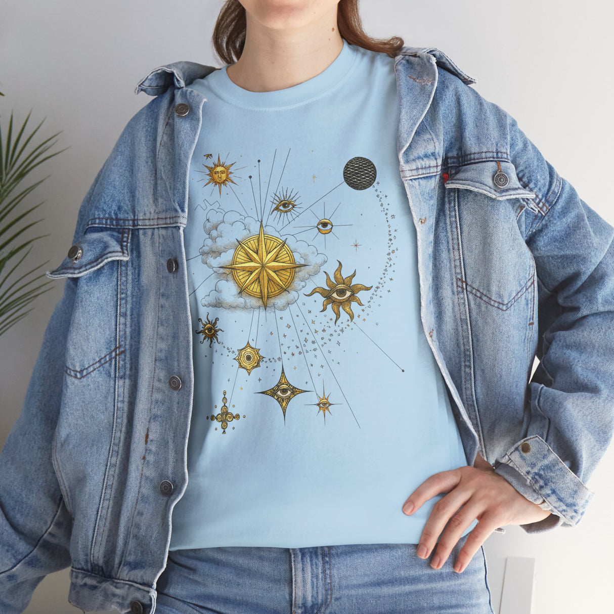 The Celestial Gold Star Map T-Shirt displayed with complementing jeans for a stylish look.