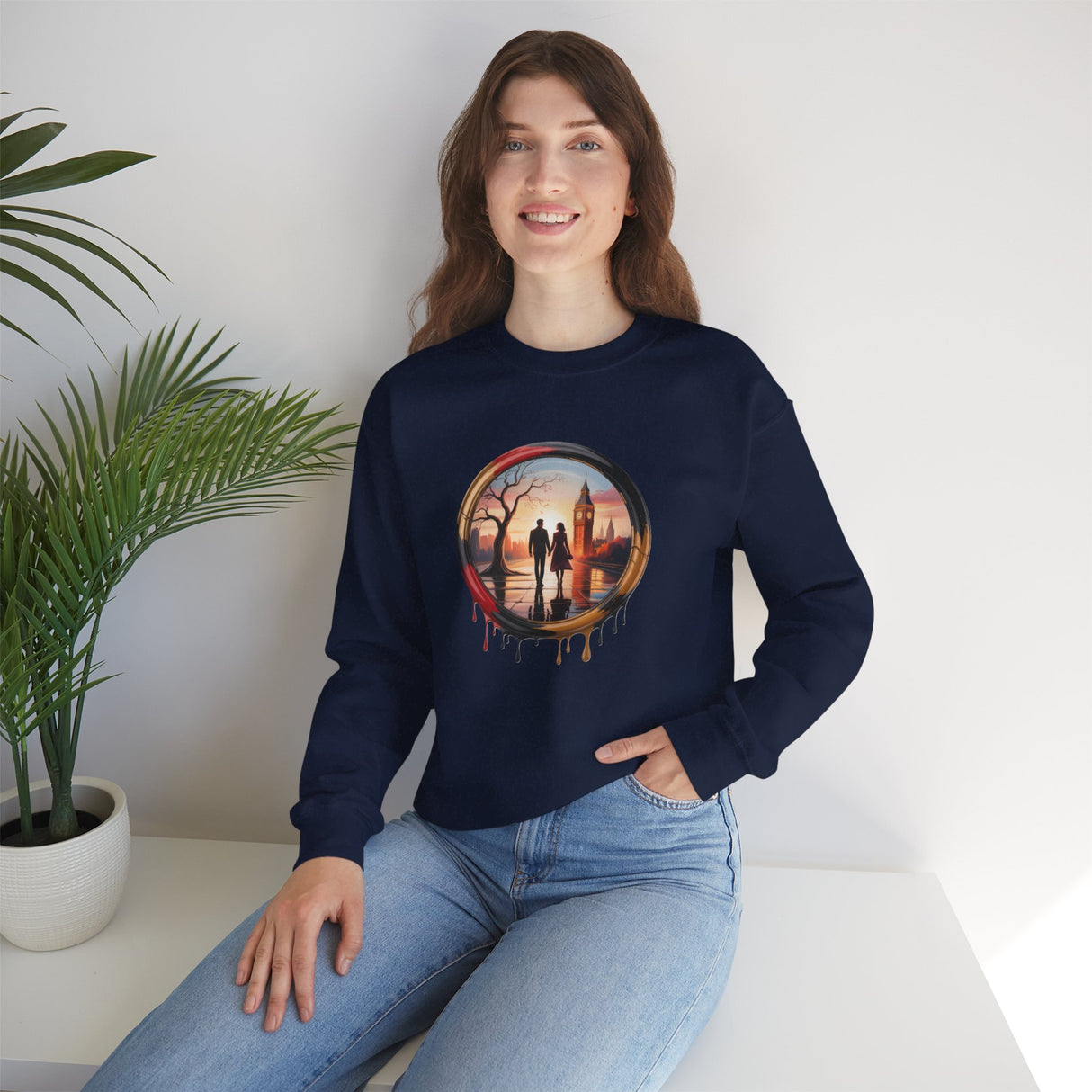 Crewneck Sweatshirt featuring Sunset Couple Silhouette in Dripping Circle, showcasing a romantic landscape with a bare tree and city skyline.