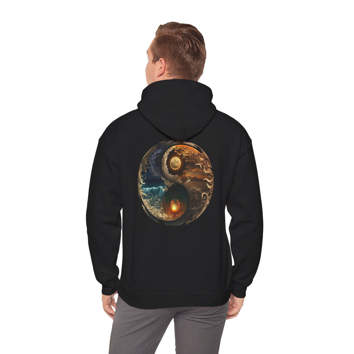 Person relaxing in the Yin Yang Moon & Sun Hoodie, demonstrating its comfort.