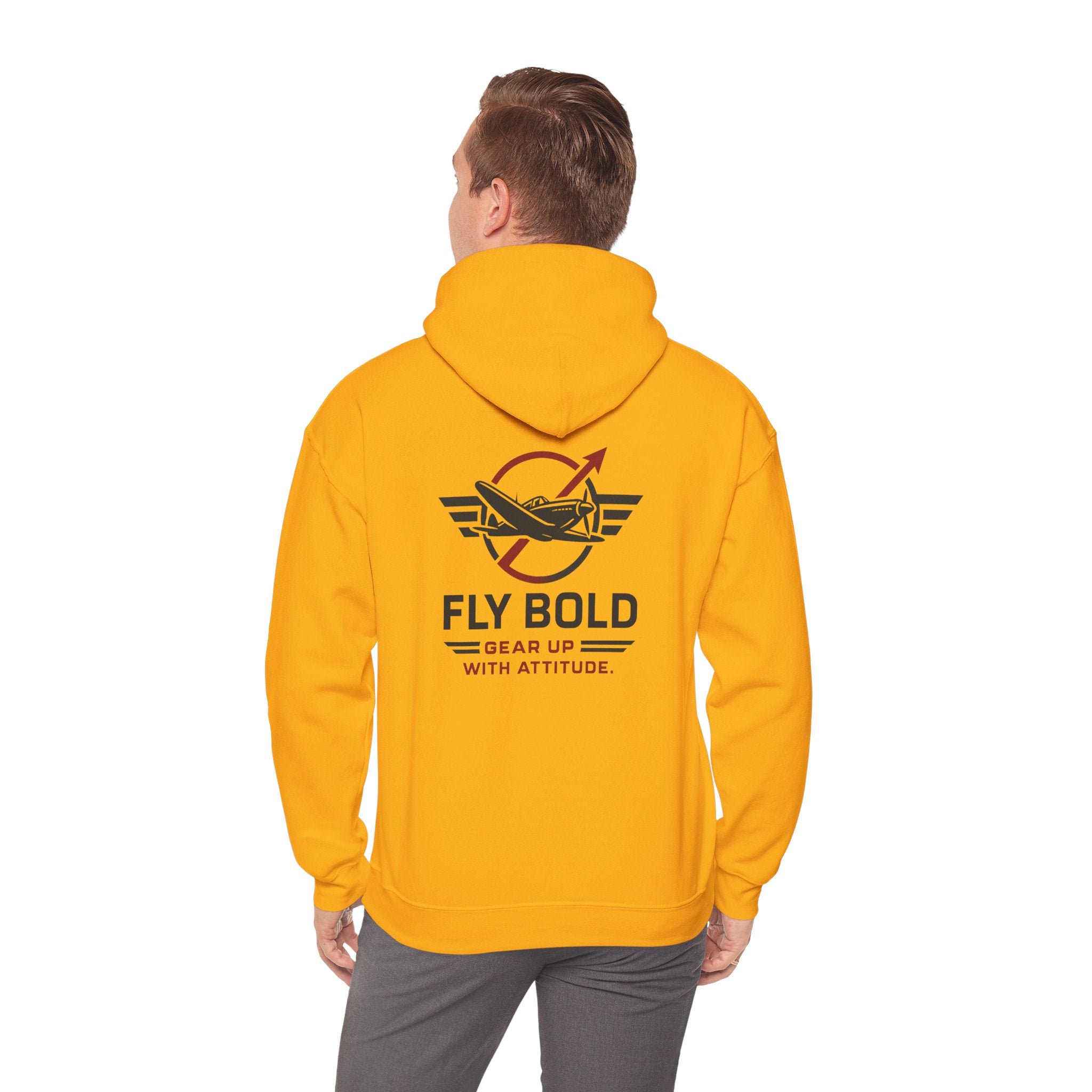 Fly Bold Hoodie in a cozy setting, perfect for chilly pre-flight walks.
