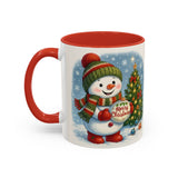Person holding the Christmas Snowman Coffee Mug filled with hot cocoa, surrounded by holiday decorations.