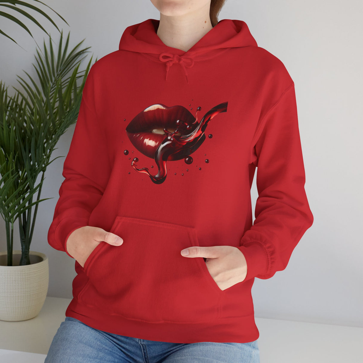 Person wearing the Lip Bite Hoodie during an evening walk, showcasing its comfort and style.